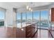 Modern kitchen with granite island, stainless steel appliances, and stunning city views at 4471 Dean Martin Dr # 801, Las Vegas, NV 89103