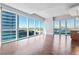 Bright living room with hardwood floors and city views at 4471 Dean Martin Dr # 801, Las Vegas, NV 89103