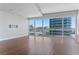 Bright living room with hardwood floors and stunning city views at 4471 Dean Martin Dr # 801, Las Vegas, NV 89103