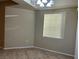 Bright dining area with tile floors and window at 4725 Basilicata Ln # 102, North Las Vegas, NV 89084