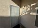 Unit entryway with a security door and number 107 at 5161 Lindell Rd # 107, Las Vegas, NV 89118