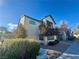 Exterior view of a two-story building with landscaping and parking at 5161 Lindell Rd # 107, Las Vegas, NV 89118