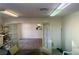 View of an office space with tiled floor and doors at 5161 Lindell Rd # 107, Las Vegas, NV 89118