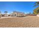 Large backyard with gravel landscaping and a view of the house at 6316 W Gowan Rd, Las Vegas, NV 89108