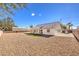 Large backyard with gravel and artificial grass at 6316 W Gowan Rd, Las Vegas, NV 89108