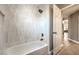 Clean bathroom with a tub shower combo at 6316 W Gowan Rd, Las Vegas, NV 89108