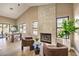 Living room with fireplace and seating area at 6316 W Gowan Rd, Las Vegas, NV 89108