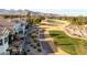 Aerial view of houses near a golf course and mountains at 9112 Eagle Ridge Dr, Las Vegas, NV 89134