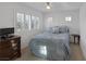 Charming bedroom with a double bed and dresser at 9112 Eagle Ridge Dr, Las Vegas, NV 89134