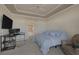 Serene bedroom with a bed and a view of the bathroom at 9112 Eagle Ridge Dr, Las Vegas, NV 89134