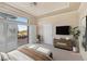 Main bedroom with sliding doors leading to a patio at 9112 Eagle Ridge Dr, Las Vegas, NV 89134