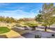 View of a lush green golf course with mature trees at 9112 Eagle Ridge Dr, Las Vegas, NV 89134