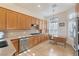 Modern kitchen with stainless steel appliances and an eat-in area at 9112 Eagle Ridge Dr, Las Vegas, NV 89134