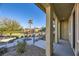 Covered patio overlooking grassy yard with playground at 965 Nevada State Dr # 1101, Henderson, NV 89002