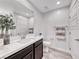 Bathroom featuring modern vanity with chrome faucet, toilet, and wood-style floors at 965 Nevada State Dr # 1101, Henderson, NV 89002