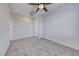 Spacious bedroom featuring carpet and a ceiling fan at 965 Nevada State Dr # 1101, Henderson, NV 89002