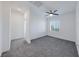 Spacious bedroom with carpet, ceiling fan and window at 965 Nevada State Dr # 1101, Henderson, NV 89002