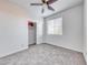 Bright bedroom featuring a ceiling fan, closet and window at 965 Nevada State Dr # 1101, Henderson, NV 89002