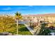 Community view showcasing park, landscaping, street, and surrounding mountain views at 965 Nevada State Dr # 1101, Henderson, NV 89002