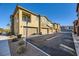 Tan two story townhome with attached garage at 965 Nevada State Dr # 1101, Henderson, NV 89002