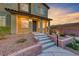 Inviting townhome exterior featuring manicured landscaping and a welcoming entrance at 965 Nevada State Dr # 1101, Henderson, NV 89002