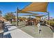 Modern playground with shade structures and rubberized surface at 965 Nevada State Dr # 1101, Henderson, NV 89002