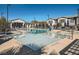 Community pool with a separate shallow area at 965 Nevada State Dr # 1101, Henderson, NV 89002