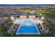 Aerial view of community pool and recreational area with lounge chairs at 361 Andy Wheeler Dr, Henderson, NV 89011