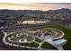 Aerial view of a park with a pond and walking paths at 361 Andy Wheeler Dr, Henderson, NV 89011