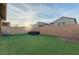 Green backyard featuring artificial turf and block wall at 361 Andy Wheeler Dr, Henderson, NV 89011