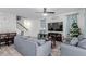 Cozy living room featuring modern furnishings, a ceiling fan, and a dining area at 361 Andy Wheeler Dr, Henderson, NV 89011