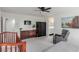 Main bedroom with neutral carpet, light gray walls, and an ensuite bathroom at 361 Andy Wheeler Dr, Henderson, NV 89011