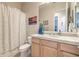 Clean bathroom with single sink and shower/tub combo at 4129 Cackling Goose Dr, North Las Vegas, NV 89084