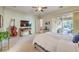 Spacious bedroom with backyard access and large TV at 4129 Cackling Goose Dr, North Las Vegas, NV 89084