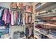 Large walk-in closet with ample shelving and hanging space at 4129 Cackling Goose Dr, North Las Vegas, NV 89084