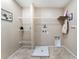 Well-organized laundry room with shelves and tile flooring at 5372 Silver Branch Ave, Las Vegas, NV 89118