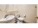 Clean and simple bathroom with white fixtures at 6547 Velvet Silk St, North Las Vegas, NV 89084