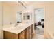 Double vanity bathroom with view into bedroom at 6547 Velvet Silk St, North Las Vegas, NV 89084