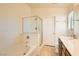 Bathroom with soaking tub and walk-in shower at 6547 Velvet Silk St, North Las Vegas, NV 89084