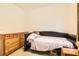 Guest bedroom with a daybed and wooden dresser at 6547 Velvet Silk St, North Las Vegas, NV 89084