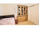 Guest bedroom featuring a daybed and a large wooden cabinet at 6547 Velvet Silk St, North Las Vegas, NV 89084