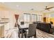 Kitchen dining area with gray table and chairs at 6547 Velvet Silk St, North Las Vegas, NV 89084