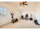 Home gym with elliptical, weights, and punching bag at 6547 Velvet Silk St, North Las Vegas, NV 89084