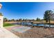 Backyard view of lush landscaping, golf course and pond with fountain at 8713 Litchfield Ave, Las Vegas, NV 89134