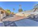 Spacious backyard with patio, fire pit, grill, and landscaping at 1550 Desertaire Way, Las Vegas, NV 89110