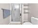 Bathroom with shower and shelving at 1550 Desertaire Way, Las Vegas, NV 89110