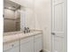 Bright bathroom featuring a vanity with a stone countertop and modern matte black fixtures at 1725 Bannie Ave, Las Vegas, NV 89102