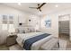 Beautifully staged bedroom with large bed, shuttered windows, and closet access at 1725 Bannie Ave, Las Vegas, NV 89102