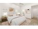 Staged bedroom with large bed, bedside tables, and stylish decor at 1725 Bannie Ave, Las Vegas, NV 89102