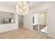 Elegant dining room with tile floors and view to the kitchen at 1725 Bannie Ave, Las Vegas, NV 89102